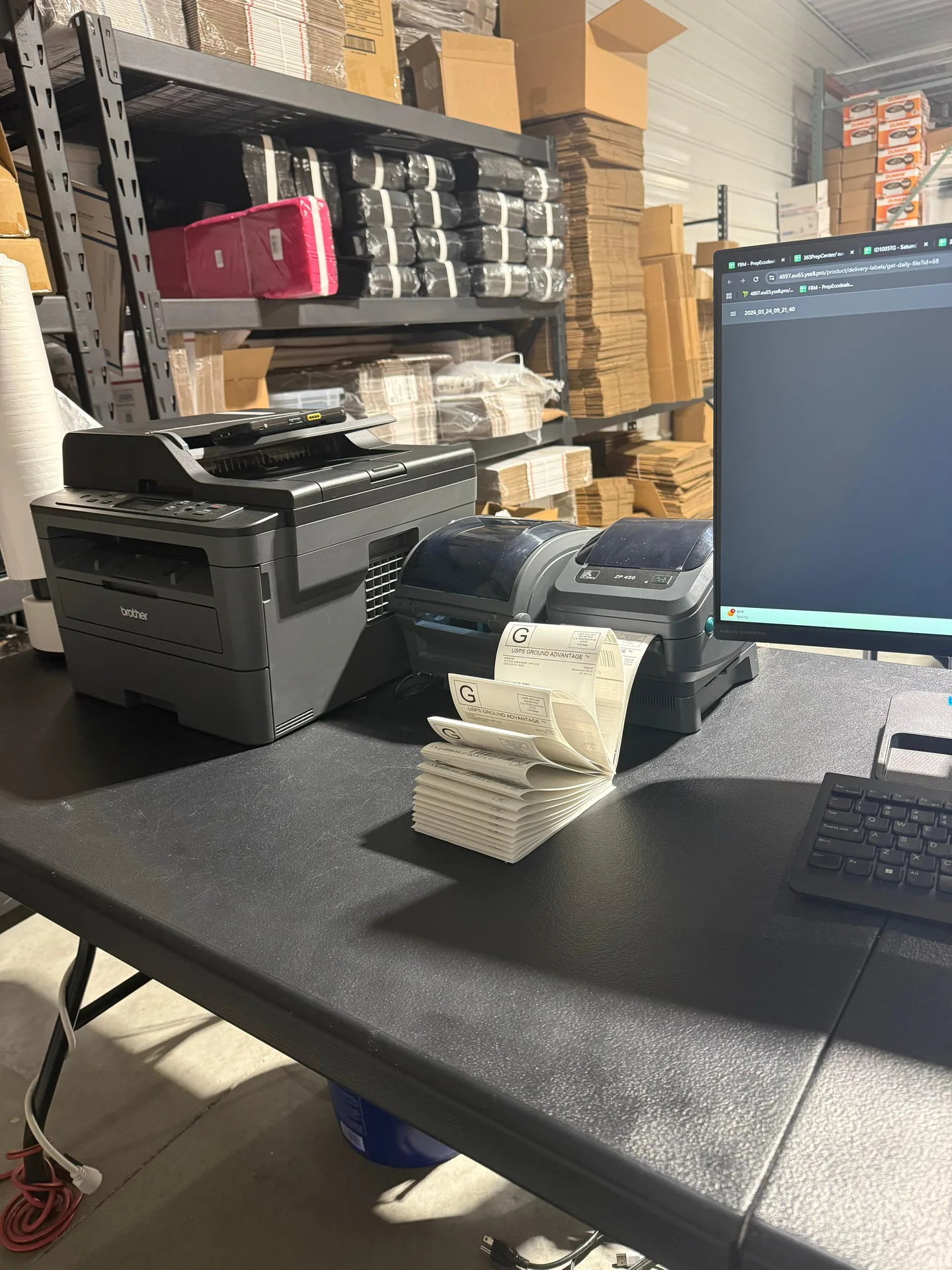 Kitting workstation with label printers at 365PrepCenter